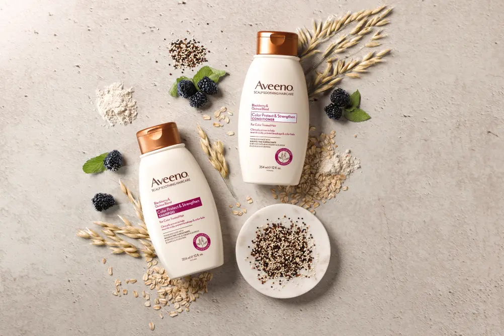 AveenoÂ® Color Protect & Strengthen haircare set displayed with its nourishing ingredients of colloidal oats and more