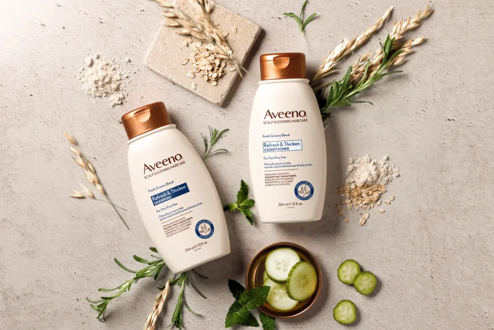 AveenoÂ® Refresh & Thicken haircare set displayed with its nourishing ingredients that add thickness to hair