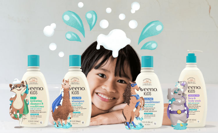 niños sonriendo con productos aveeno kids